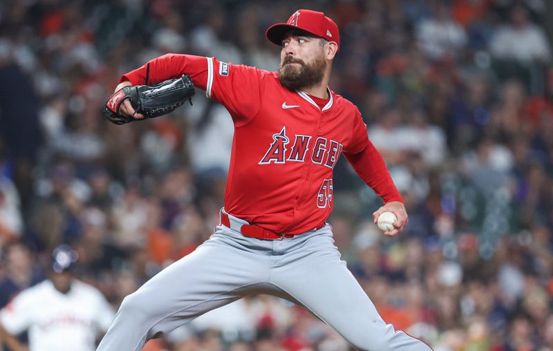 May 21, 2024; Houston, Texas, USA; Los Angeles Angels relief pitcher Matt Moore (55) delivers a pitch during the eighth inning against the Houston Astros at Minute Maid Park. Mandatory Credit: Troy Taormina-USA TODAY Sports