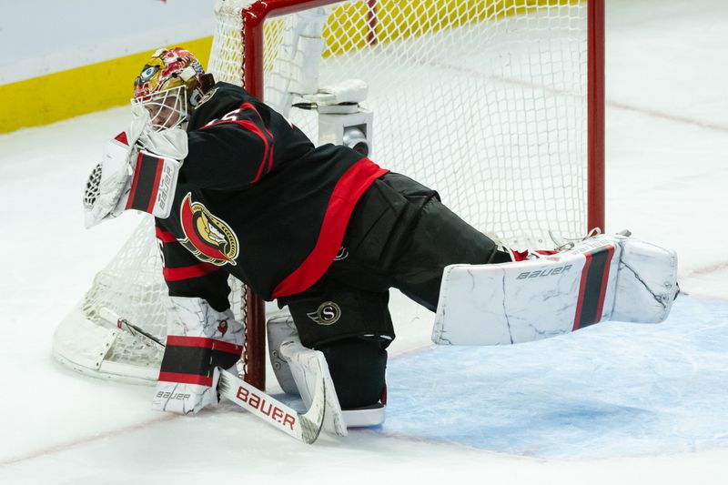 May 1, 2025; Ottawa, Ontario, CAN; Ottawa Senators goalie Linus Ullmark (35) makes a save in game six of the first round of the 2025 Stanley Cup Playoffs against the Toronto Maple Leafs at Canadian Tire Centre. Mandatory Credit: Marc DesRosiers-Imagn Images
