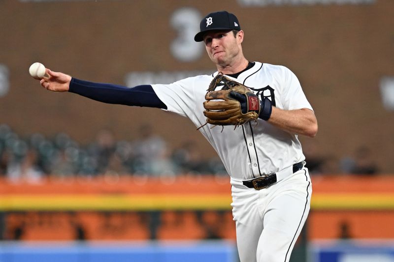 Sep 10, 2024; Detroit, Michigan, USA; Detroit Tigers second baseman Colt Keith (33) throws out a Colorado Rockies baserunner in the fourth inning at Comerica Park. Mandatory Credit: Lon Horwedel-Imagn Images