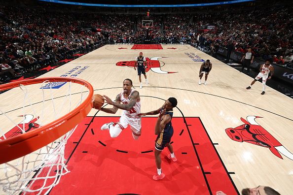 CHICAGO, IL - DECEMBER 2: DeMar DeRozan #11 of the Chicago Bulls drives to the basket during the game against the New Orleans Pelicans on December 2, 2023 at United Center in Chicago, Illinois. NOTE TO USER: User expressly acknowledges and agrees that, by downloading and or using this photograph, User is consenting to the terms and conditions of the Getty Images License Agreement. Mandatory Copyright Notice: Copyright 2023 NBAE (Photo by Jeff Haynes/NBAE via Getty Images)