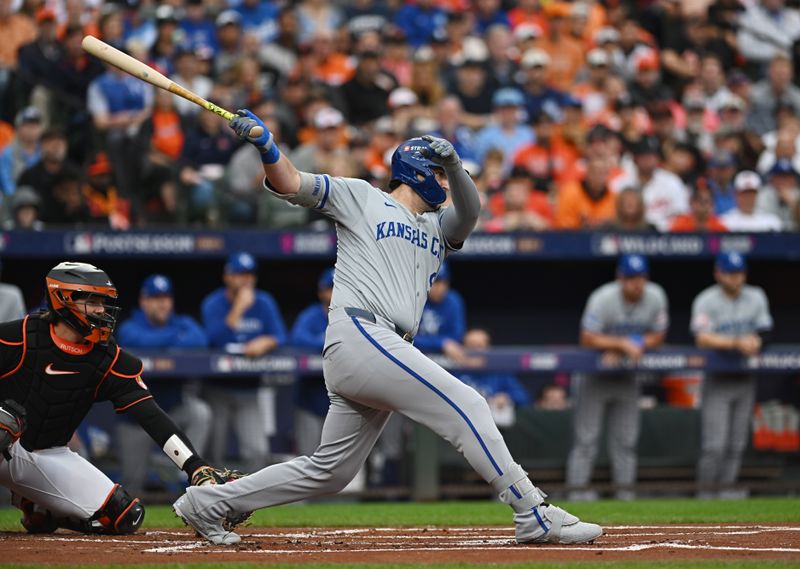 Oct 2, 2024; Baltimore, Maryland, USA; Kansas City Royals designated hitter Vinnie Pasquantino (9) hits a RBI single in the first inning against the Baltimore Orioles in game two of the Wild Card round for the 2024 MLB Playoffs at Oriole Park at Camden Yards. Mandatory Credit: Tommy Gilligan-Imagn Images