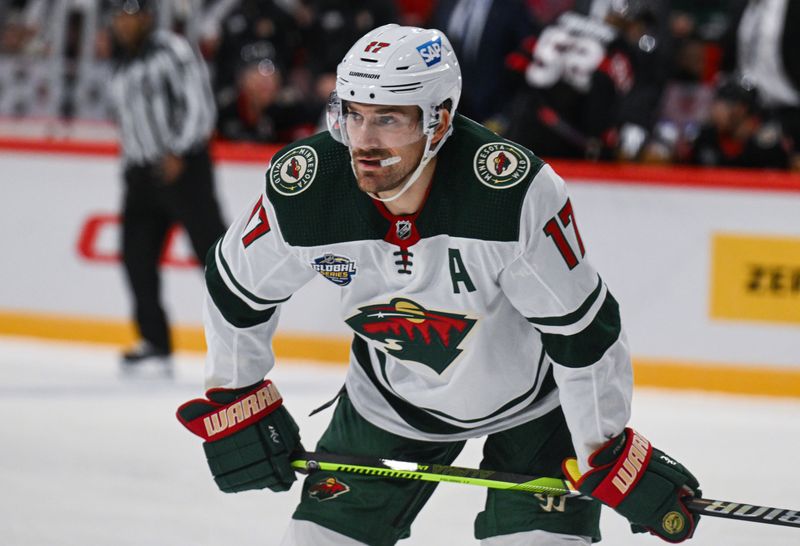 Nov 18, 2023; Stockholm, SWE; Minnesota Wild left wing Marcus Foligno (17) in action against the Ottawa Senators during a Global Series NHL hockey game at Avicii Arena. Mandatory Credit: Per Haljestam-USA TODAY Sports