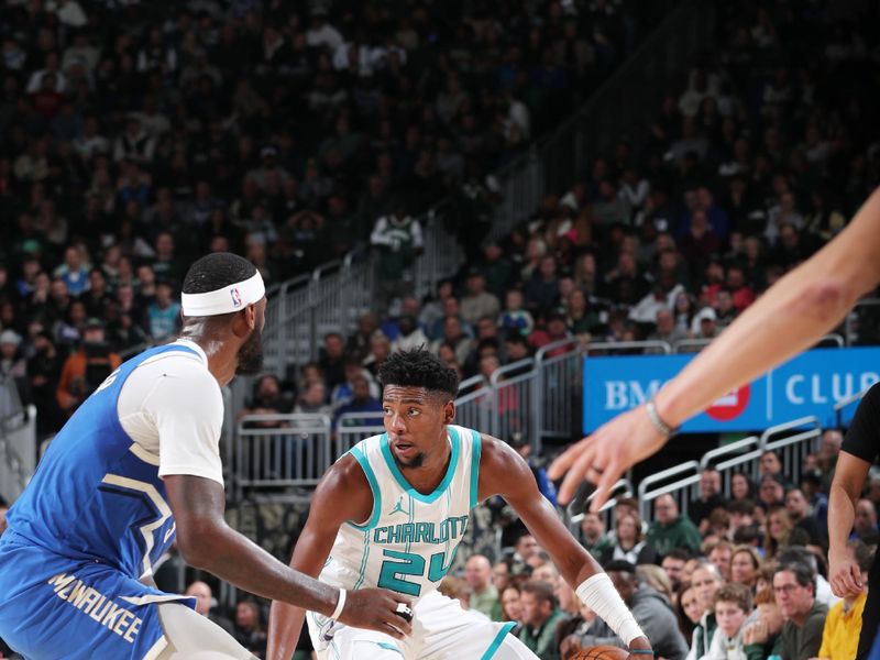 MILWAUKEE, WI - NOVEMBER 23: Brandon Miller #24 of the Charlotte Hornets looks to pass the ball during the game against the Milwaukee Bucks on November 23, 2024 at the Fiserv Forum Center in Milwaukee, Wisconsin. NOTE TO USER: User expressly acknowledges and agrees that, by downloading and or using this Photograph, user is consenting to the terms and conditions of the Getty Images License Agreement. Mandatory Copyright Notice: Copyright 2024 NBAE (Photo by Gary Dineen/NBAE via Getty Images).