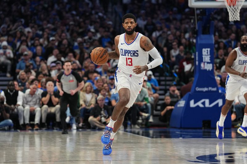 DALLAS, TX - APRIL 28: Paul George #13 of the LA Clippers handles the ball during the game against the Dallas Mavericks during Round 1 Game 4 of the 2024 NBA Playoffs on April 28, 2024 at the American Airlines Center in Dallas, Texas. NOTE TO USER: User expressly acknowledges and agrees that, by downloading and or using this photograph, User is consenting to the terms and conditions of the Getty Images License Agreement. Mandatory Copyright Notice: Copyright 2024 NBAE (Photo by Glenn James/NBAE via Getty Images)