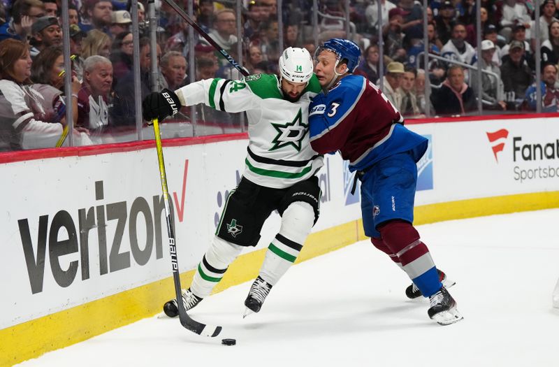 May 17, 2024; Denver, Colorado, USA; Dallas Stars left wing Jamie Benn (14) and Colorado Avalanche defenseman Jack Johnson (3) in the first period in game six of the second round of the 2024 Stanley Cup Playoffs at Ball Arena. Mandatory Credit: Ron Chenoy-USA TODAY Sports