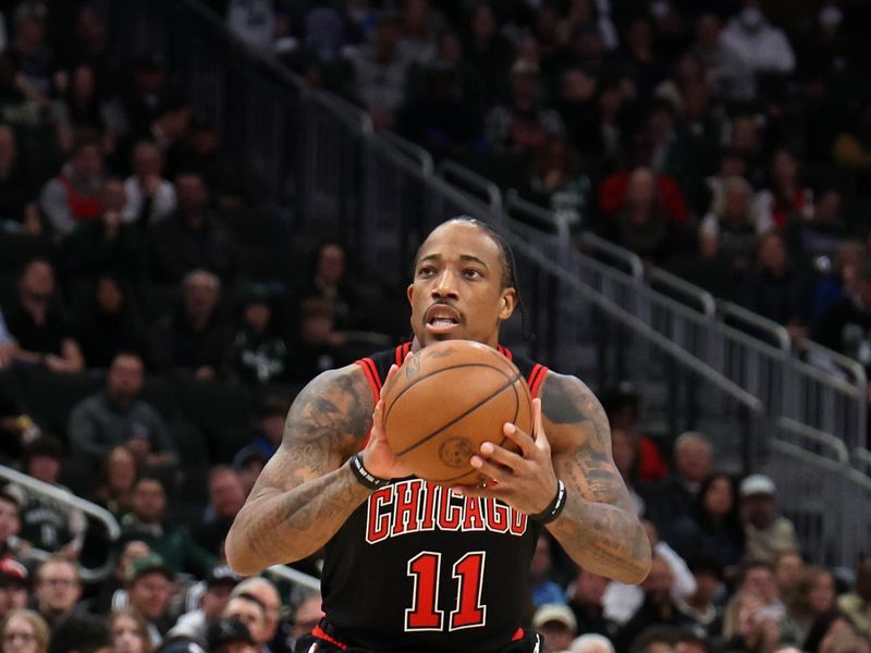 MILWAUKEE, WISCONSIN - NOVEMBER 13: DeMar DeRozan #11 of the Chicago Bulls takes a shot during a game against the Milwaukee Bucks at Fiserv Forum on November 13, 2023 in Milwaukee, Wisconsin. NOTE TO USER: User expressly acknowledges and agrees that, by downloading and or using this photograph, User is consenting to the terms and conditions of the Getty Images License Agreement. (Photo by Stacy Revere/Getty Images)