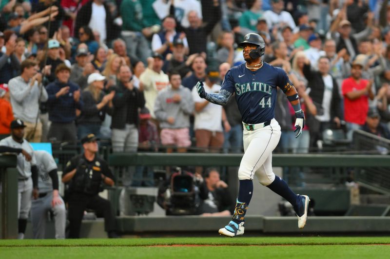 Jun 13, 2024; Seattle, Washington, USA; Seattle Mariners center fielder Julio Rodriguez (44) runs the bases after hitting a home run against the Chicago White Sox during the ninth inning at T-Mobile Park. Mandatory Credit: Steven Bisig-USA TODAY Sports