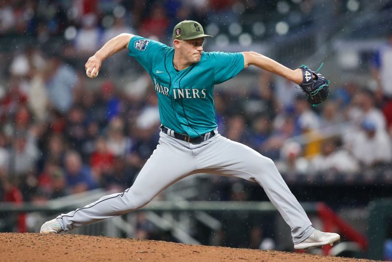 May 20, 2023; Atlanta, Georgia, USA; Seattle Mariners relief pitcher Paul Sewald (37) throws against the Atlanta Braves in the ninth inning at Truist Park. Mandatory Credit: Brett Davis-USA TODAY Sports