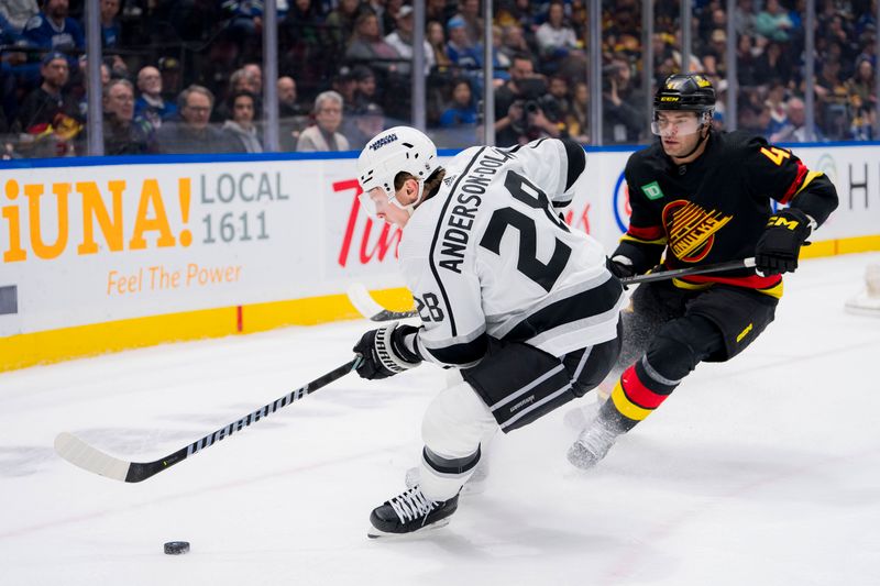 Feb 29, 2024; Vancouver, British Columbia, CAN; Vancouver Canucks defenseman Noah Juulsen (47) defends against Los Angeles Kings forward Jaret Anderson-Dolan (28) in the first period at Rogers Arena. Mandatory Credit: Bob Frid-USA TODAY Sports