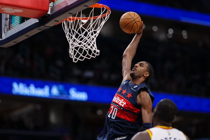 WASHINGTON, DC - NOVEMBER 04: Alexandre Sarr #20 of the Washington Wizards dunks the ball against the Golden State Warriors during the second half at Capital One Arena on November 04, 2024 in Washington, DC. NOTE TO USER: User expressly acknowledges and agrees that, by downloading and or using this photograph, User is consenting to the terms and conditions of the Getty Images License Agreement. (Photo by Scott Taetsch/Getty Images)