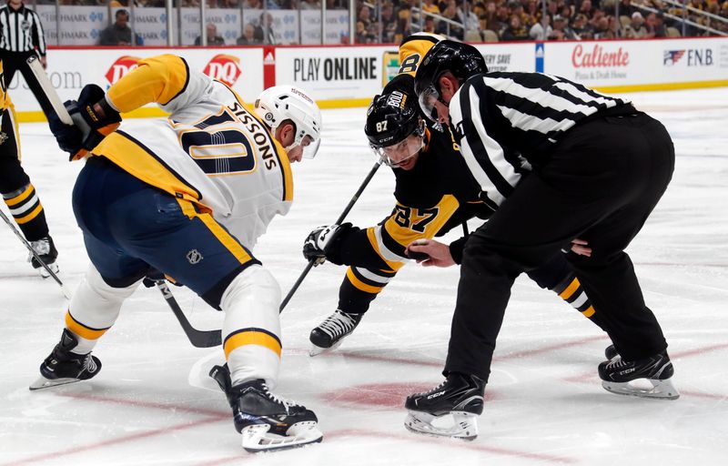 Apr 15, 2024; Pittsburgh, Pennsylvania, USA;  Nashville Predators center Colton Sissons (10) and Pittsburgh Penguins center Sidney Crosby (87) take a face-off during the third period at PPG Paints Arena. The Penguins won 4-2. Mandatory Credit: Charles LeClaire-USA TODAY Sports