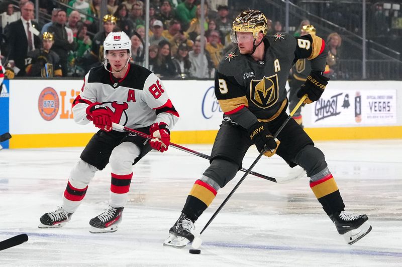 Mar 17, 2024; Las Vegas, Nevada, USA; Vegas Golden Knights center Jack Eichel (9) skates ahead of New Jersey Devils center Jack Hughes (86) during the first period at T-Mobile Arena. Mandatory Credit: Stephen R. Sylvanie-USA TODAY Sports