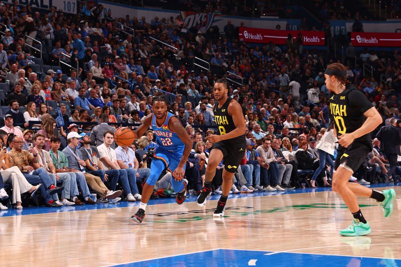 OKLAHOMA CITY, OK - MARCH 20: Cason Wallace #22 of the Oklahoma City Thunder  dribbles the ball during the game against the Utah Jazz on March 20, 2024 at Paycom Arena in Oklahoma City, Oklahoma. NOTE TO USER: User expressly acknowledges and agrees that, by downloading and or using this photograph, User is consenting to the terms and conditions of the Getty Images License Agreement. Mandatory Copyright Notice: Copyright 2024 NBAE (Photo by Zach Beeker/NBAE via Getty Images)