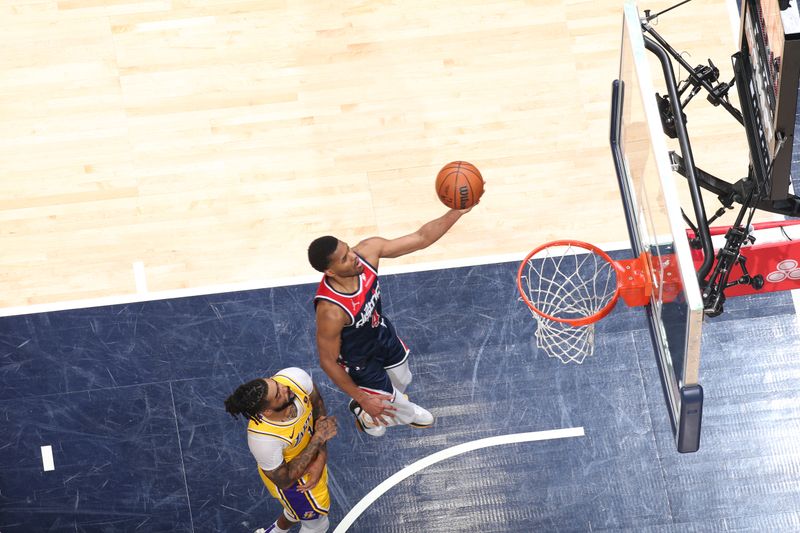 WASHINGTON, DC -? APRIL 3: Jared Butler #4 of the Washington Wizards shoots the ball during the game against the Los Angeles Lakers on April 3, 2024 at Capital One Arena in Washington, DC. NOTE TO USER: User expressly acknowledges and agrees that, by downloading and or using this Photograph, user is consenting to the terms and conditions of the Getty Images License Agreement. Mandatory Copyright Notice: Copyright 2024 NBAE (Photo by Stephen Gosling/NBAE via Getty Images)