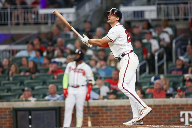 Sep 7, 2023; Atlanta, Georgia, USA; Atlanta Braves first baseman Matt Olson (28) hits a home run against the St. Louis Cardinals in the fifth inning at Truist Park. Mandatory Credit: Brett Davis-USA TODAY Sports
