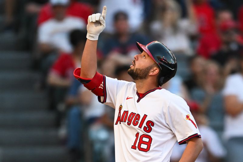 Jul 27, 2024; Anaheim, California, USA; Los Angeles Angels first baseman Nolan Schanuel (18) celebrates after hitting a home run against the Oakland Athletics during the third inning at Angel Stadium. Mandatory Credit: Jonathan Hui-USA TODAY Sports