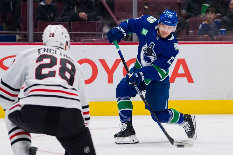 Apr 6, 2023; Vancouver, British Columbia, CAN; Vancouver Canucks forward Anthony Beauvillier (72) shoots against the Chicago Blackhawks in the second period at Rogers Arena. Mandatory Credit: Bob Frid-USA TODAY Sports