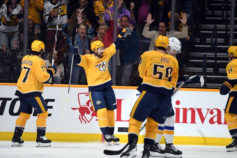 Apr 4, 2024; Nashville, Tennessee, USA; Nashville Predators left wing Filip Forsberg (9) celebrates after a goal during the second period against the St. Louis Blues at Bridgestone Arena. Mandatory Credit: Christopher Hanewinckel-USA TODAY Sports