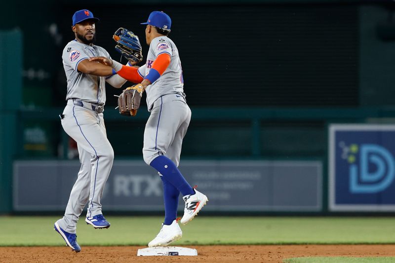 Jun 4, 2024; Washington, District of Columbia, USA; New York Mets outfielder Starling Marte (6) celebrates with Mets shortstop Francisco Lindor (12) after their game against the Washington Nationals at Nationals Park. Mandatory Credit: Geoff Burke-USA TODAY Sports