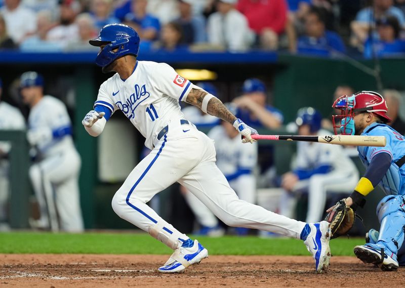 Aug 10, 2024; Kansas City, Missouri, USA; Kansas City Royals second baseman Maikel Garcia (11) hits an RBI single against the St. Louis Cardinals during the XXXX inning at Kauffman Stadium. Mandatory Credit: Jay Biggerstaff-USA TODAY Sports