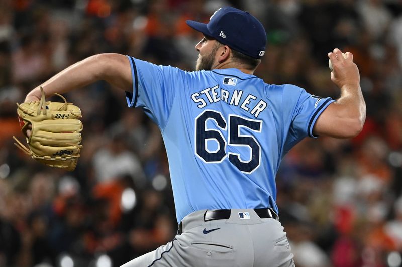 May 31, 2024; Baltimore, Maryland, USA;  Tampa Bay Rays pitcher Justin Sterner (65) throws a sixth inning pitch against the Baltimore Orioles at Oriole Park at Camden Yards. Mandatory Credit: Tommy Gilligan-USA TODAY Sports