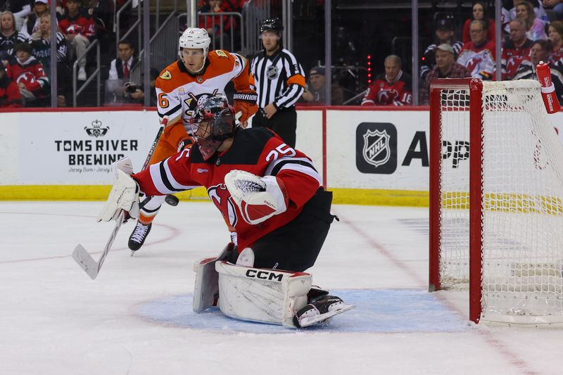 Oct 27, 2024; Newark, New Jersey, USA; New Jersey Devils goaltender Jacob Markstrom (25) makes a save against the Anaheim Ducks during the third period at Prudential Center. Mandatory Credit: Ed Mulholland-Imagn Images