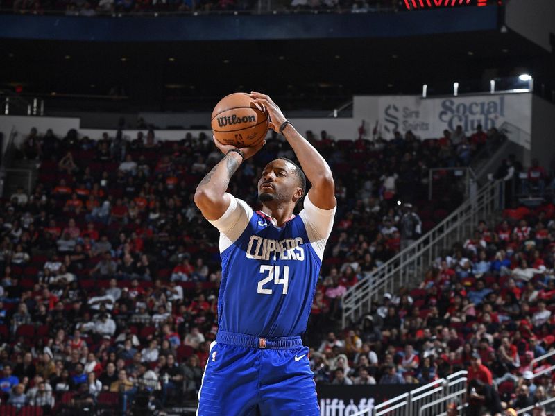 HOUSTON, TX - MARCH 6: Norman Powell #24 of the LA Clippers three point basket during the game against the Houston Rockets on March 6, 2024 at the Toyota Center in Houston, Texas. NOTE TO USER: User expressly acknowledges and agrees that, by downloading and or using this photograph, User is consenting to the terms and conditions of the Getty Images License Agreement. Mandatory Copyright Notice: Copyright 2024 NBAE (Photo by Logan Riely/NBAE via Getty Images)