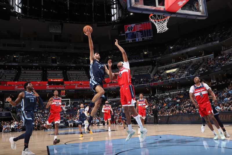 MEMPHIS, TN - NOVEMBER 8: Santi Aldama #7 of the Memphis Grizzlies drives to the basket during the game against the Washington Wizards on November 8, 2024 at FedExForum in Memphis, Tennessee. NOTE TO USER: User expressly acknowledges and agrees that, by downloading and or using this photograph, User is consenting to the terms and conditions of the Getty Images License Agreement. Mandatory Copyright Notice: Copyright 2024 NBAE (Photo by Joe Murphy/NBAE via Getty Images)