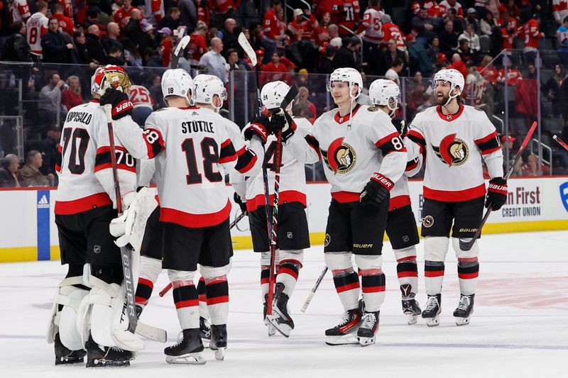 Jan 31, 2024; Detroit, Michigan, USA;  Ottawa Senators celebrate after defeating the Detroit Red Wings at Little Caesars Arena. Mandatory Credit: Rick Osentoski-USA TODAY Sports