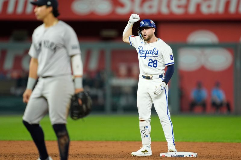 Oct 9, 2024; Kansas City, Missouri, USA; Kansas City Royals outfielder Kyle Isbel (28) celebrates an RBI-double in the fifth inning against the New York Yankees during game three of the NLDS for the 2024 MLB Playoffs at Kauffman Stadium. Mandatory Credit: Jay Biggerstaff -Imagn Images