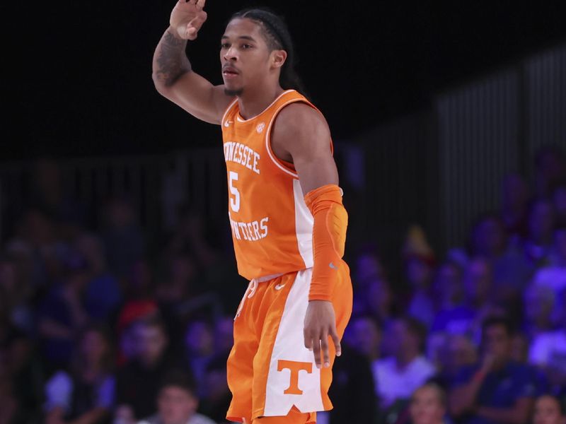 Nov 25, 2022; Paradise Island, BAHAMAS; Tennessee Volunteers guard Zakai Zeigler (5) reacts after scoring during the second half against the Kansas Jayhawks  at Imperial Arena. Mandatory Credit: Kevin Jairaj-USA TODAY Sports