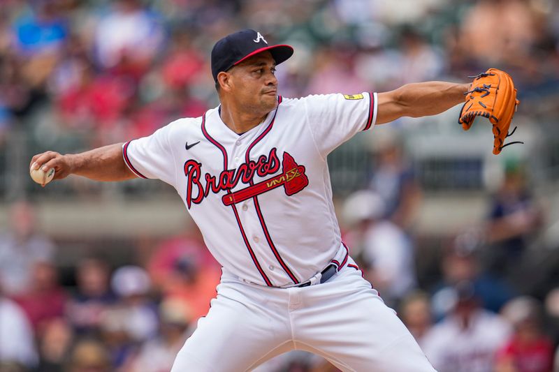 Aug 2, 2023; Cumberland, Georgia, USA; Atlanta Braves starting pitcher Yonny Chirinos (56) pitches against the Los Angeles Angels during the first inning at Truist Park. Mandatory Credit: Dale Zanine-USA TODAY Sports