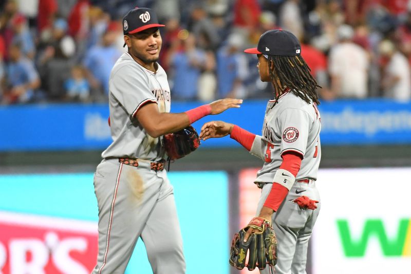 May 1, 2025; Philadelphia, Pennsylvania, USA; Washington Nationals outfielder James Wood (29) and shortstop CJ Abrams (5) celebrate win against the Philadelphia Phillies at Citizens Bank Park. Mandatory Credit: Eric Hartline-Imagn Images