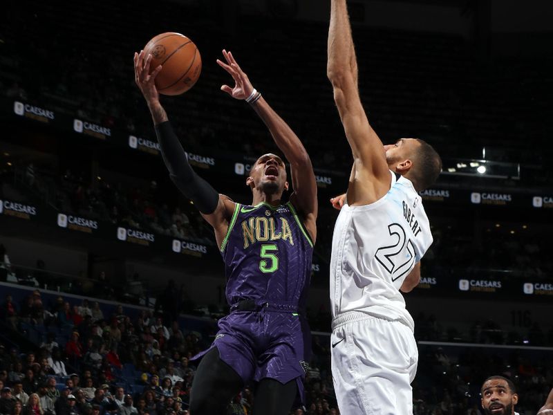 NEW ORLEANS, LA - JANUARY 7: Dejounte Murray #5 of the New Orleans Pelicans drives to the basket during the game against the Minnesota Timberwolves on January 7, 2025 at the Smoothie King Center in New Orleans, Louisiana. NOTE TO USER: User expressly acknowledges and agrees that, by downloading and or using this Photograph, user is consenting to the terms and conditions of the Getty Images License Agreement. Mandatory Copyright Notice: Copyright 2025 NBAE(Photo by Layne Murdoch Jr./NBAE via Getty Images)