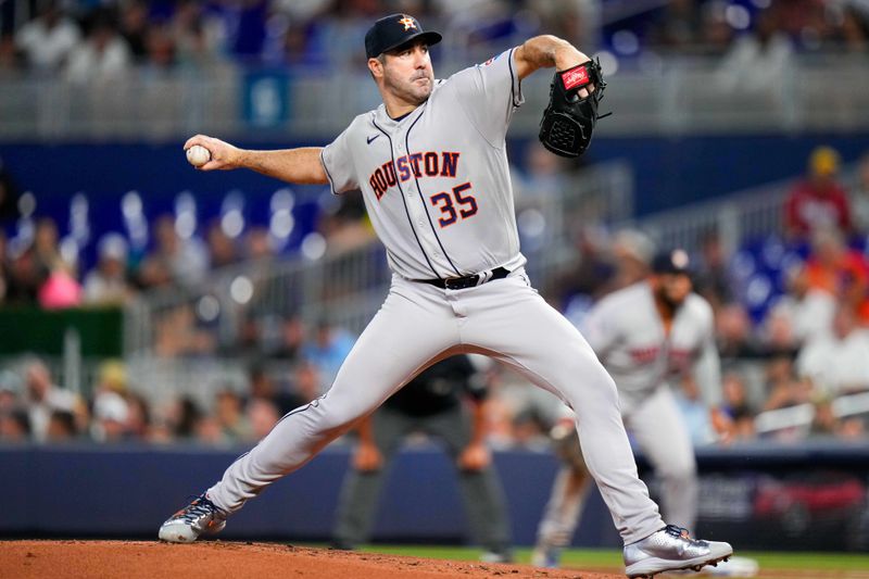 Aug 16, 2023; Miami, Florida, USA; Houston Astros starting pitcher Justin Verlander (35) throws a pitch against the Miami Marlins during the first inning at loanDepot Park. Mandatory Credit: Rich Storry-USA TODAY Sports