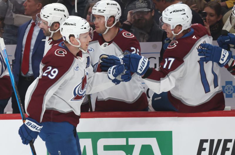Mar 24, 2026; Pittsburgh, Pennsylvania, USA;  Colorado Avalanche center Nathan MacKinnon (29) celebrates with the Avalanche bench after scoring a goal against the Pittsburgh Penguins during the first period at PPG Paints Arena. Mandatory Credit: Charles LeClaire-Imagn Images