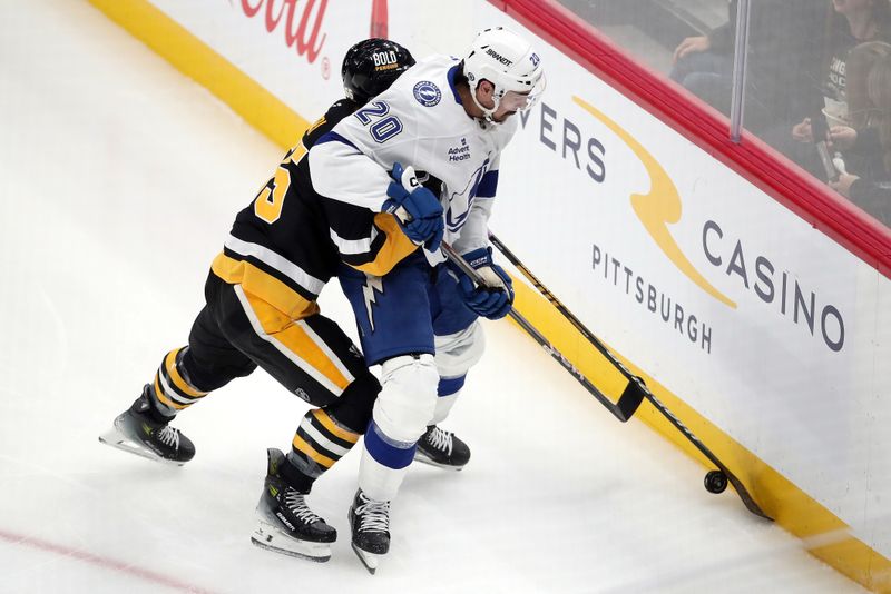 Nov 19, 2024; Pittsburgh, Pennsylvania, USA;  Pittsburgh Penguins center Noel Acciari (55) pressures Tampa Bay Lightning left wing Nick Paul (20) during the second period at PPG Paints Arena. Mandatory Credit: Charles LeClaire-Imagn Images