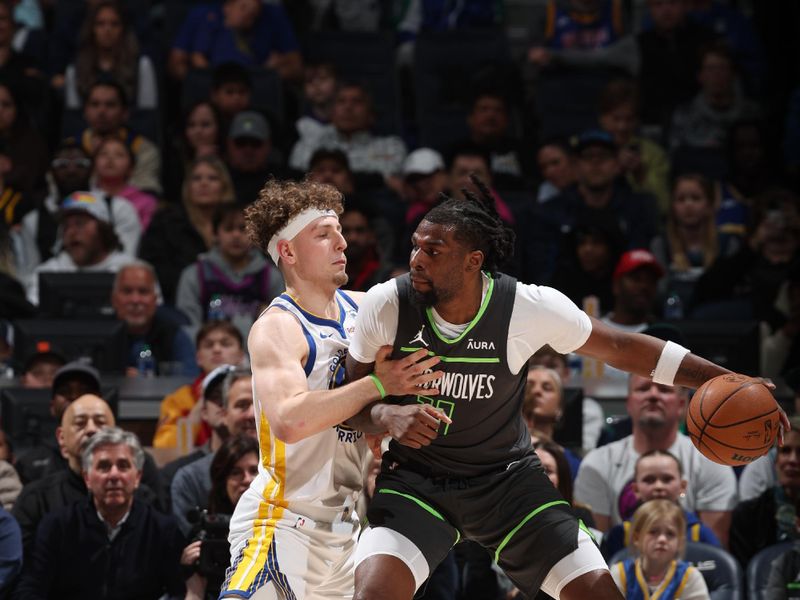 MINNEAPOLIS, MN -  MARCH 24: Naz Reid #11 of the Minnesota Timberwolves handles the ball during the game against the Golden State Warriors on March 24, 2024 at Target Center in Minneapolis, Minnesota. NOTE TO USER: User expressly acknowledges and agrees that, by downloading and or using this Photograph, user is consenting to the terms and conditions of the Getty Images License Agreement. Mandatory Copyright Notice: Copyright 2024 NBAE (Photo by David Sherman/NBAE via Getty Images)