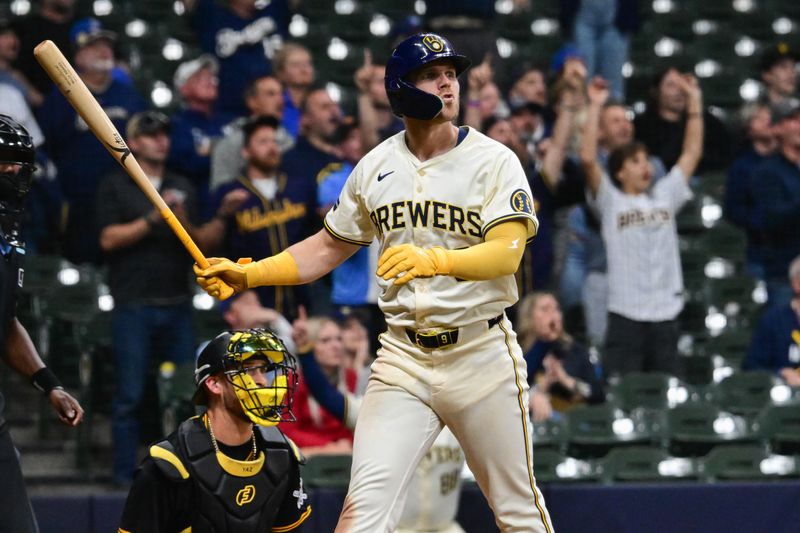 May 13, 2024; Milwaukee, Wisconsin, USA; Milwaukee Brewers left fielder Jake Bauers (9) watches after hitting a grand slam home run in the eighth inning against the Pittsburgh Pirates at American Family Field. Mandatory Credit: Benny Sieu-USA TODAY Sports