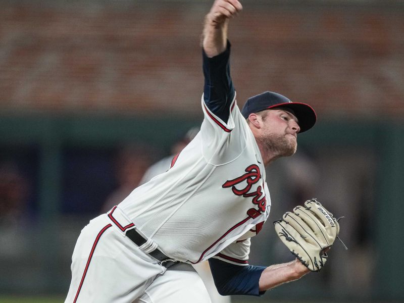 Aug 15, 2023; Cumberland, Georgia, USA; Atlanta Braves starting pitcher Bryce Elder (55) pitches against the New York Yankees during the seventh inning at Truist Park. Mandatory Credit: Dale Zanine-USA TODAY Sports