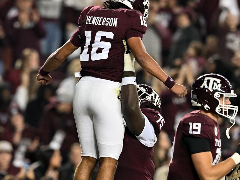 Nov 11, 2023; College Station, Texas, USA; Texas A&M Aggies offensive lineman Kam Dewberry (75) hoists quarterback Jaylen Henderson (16) in the air in celebration of his touchdown during the first quarter against the Mississippi State Bulldogs at Kyle Field. Mandatory Credit: Maria Lysaker-USA TODAY Sports