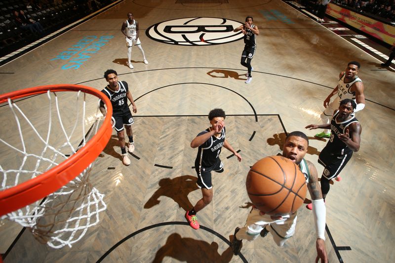 BROOKLYN, NY - DECEMBER 8: Damian Lillard #0 of the Milwaukee Bucks shoots the ball during the game against the Brooklyn Nets on December 8, 2024 at Barclays Center in Brooklyn, New York. NOTE TO USER: User expressly acknowledges and agrees that, by downloading and or using this Photograph, user is consenting to the terms and conditions of the Getty Images License Agreement. Mandatory Copyright Notice: Copyright 2024 NBAE (Photo by Nathaniel S. Butler/NBAE via Getty Images)