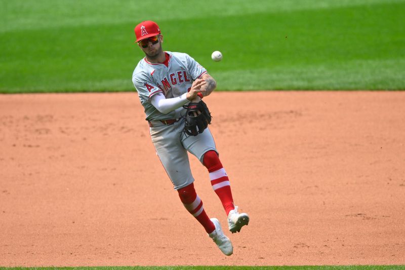 May 5, 2024; Cleveland, Ohio, USA; Los Angeles Angels shortstop Zach Neto (9) throws to first base in the fifth inning against the Cleveland Guardians at Progressive Field. Mandatory Credit: David Richard-USA TODAY Sports