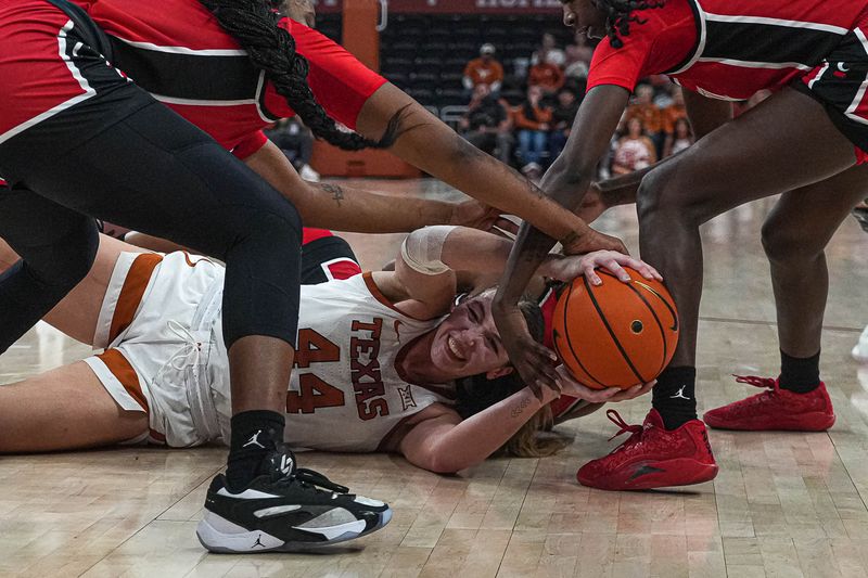 Jan 27, 2024; Austin, TX, USA; Texas Longhorns forward Taylor Jones (44) fights for a loose ball during a game against the Cincinnati Bearcats at the Moody Center. Mandatory Credit: Aaron E. Martinez/American-Statesman via USA TODAY NETWORK