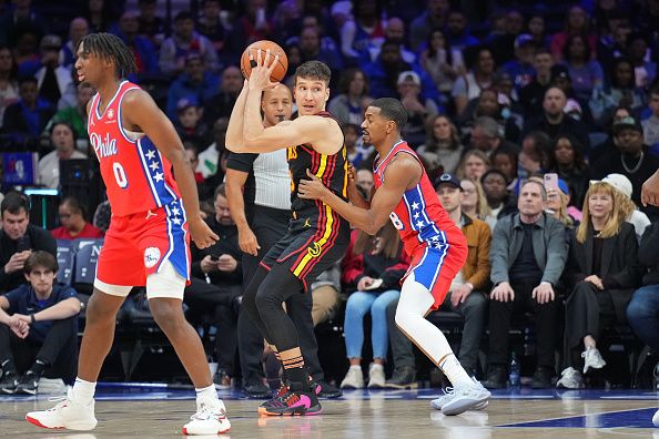 PHILADELPHIA, PA - DECEMBER 8: Bogdan Bogdanovic #13 of the Atlanta Hawks handles the ball during the game against the Philadelphia 76ers on December 8, 2023 at the Wells Fargo Center in Philadelphia, Pennsylvania NOTE TO USER: User expressly acknowledges and agrees that, by downloading and/or using this Photograph, user is consenting to the terms and conditions of the Getty Images License Agreement. Mandatory Copyright Notice: Copyright 2023 NBAE (Photo by Jesse D. Garrabrant/NBAE via Getty Images)