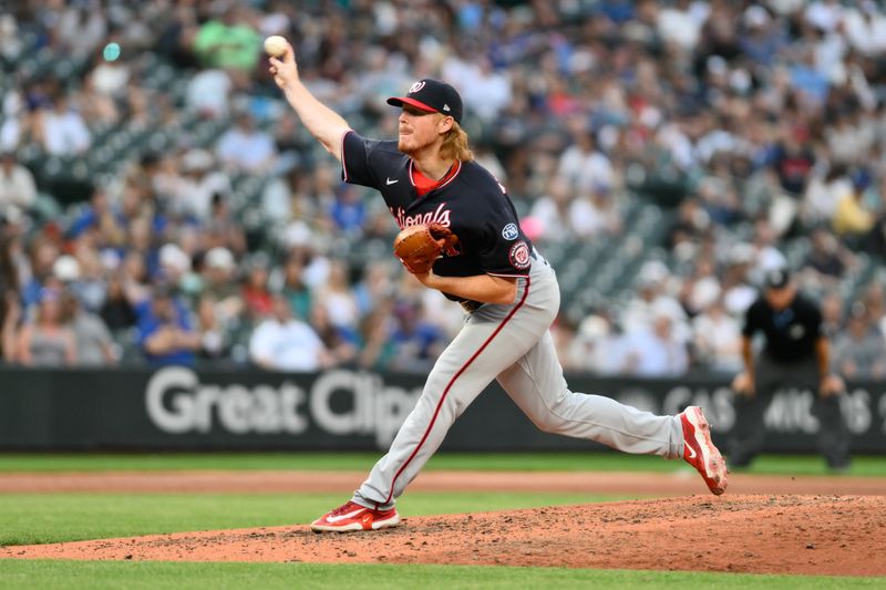 Jun 27, 2023; Seattle, Washington, USA; Washington Nationals relief pitcher Mason Thompson (71) pitches to the Seattle Mariners during the sixth inning at T-Mobile Park. Mandatory Credit: Steven Bisig-USA TODAY Sports