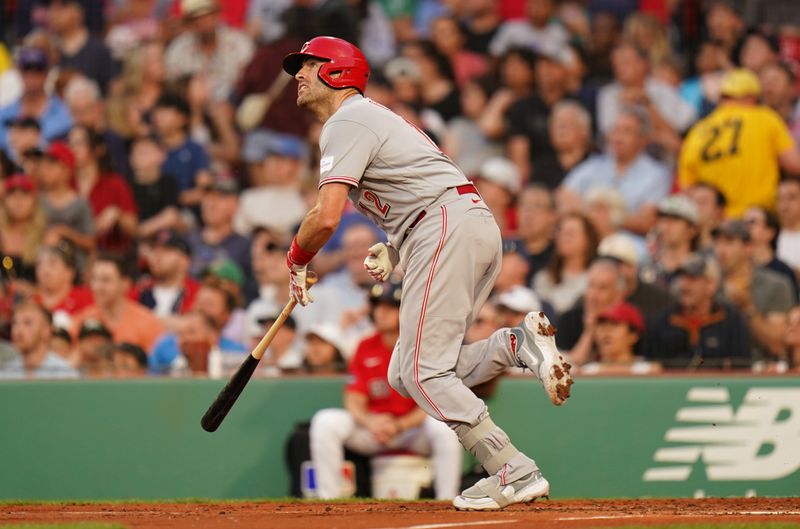 Jun 1, 2023; Boston, Massachusetts, USA; Cincinnati Reds catcher Curt Casali (12) hits a double against the Boston Red Sox in the third inning at Fenway Park. Mandatory Credit: David Butler II-USA TODAY Sports