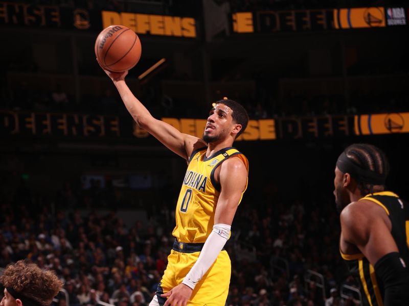 SAN FRANCISCO, CA - MARCH 22: Tyrese Haliburton #0 of the Indiana Pacers shoots the ball during the game against the Golden State Warriors on March 22, 2024 at Chase Center in San Francisco, California. NOTE TO USER: User expressly acknowledges and agrees that, by downloading and or using this photograph, user is consenting to the terms and conditions of Getty Images License Agreement. Mandatory Copyright Notice: Copyright 2024 NBAE (Photo by Jed Jacobsohn/NBAE via Getty Images)