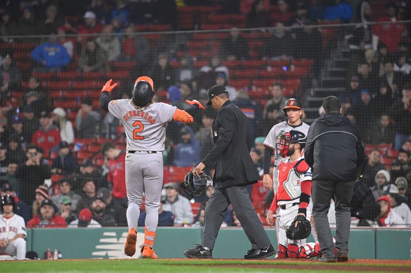 Apr 11, 20024; Boston, Massachusetts, USA; Baltimore Orioles shortstop Gunnar Henderson (2) reacts to two run home run against the Boston Red Sox during the tenth inning at Fenway Park. Mandatory Credit: Eric Canha-USA TODAY Sports