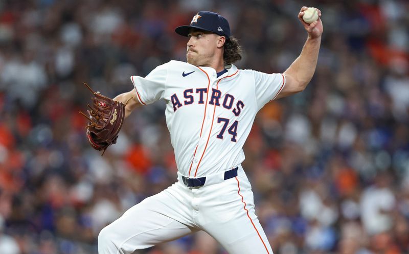 Jul 27, 2024; Houston, Texas, USA; Houston Astros relief pitcher Bryan King (74) delivers a pitch during the fifth inning against the Los Angeles Dodgers at Minute Maid Park. Mandatory Credit: Troy Taormina-USA TODAY Sports
